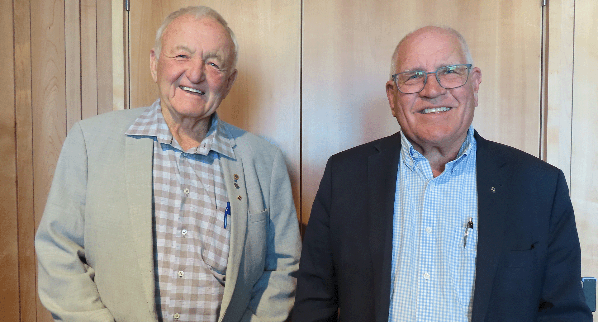 Two men standing together