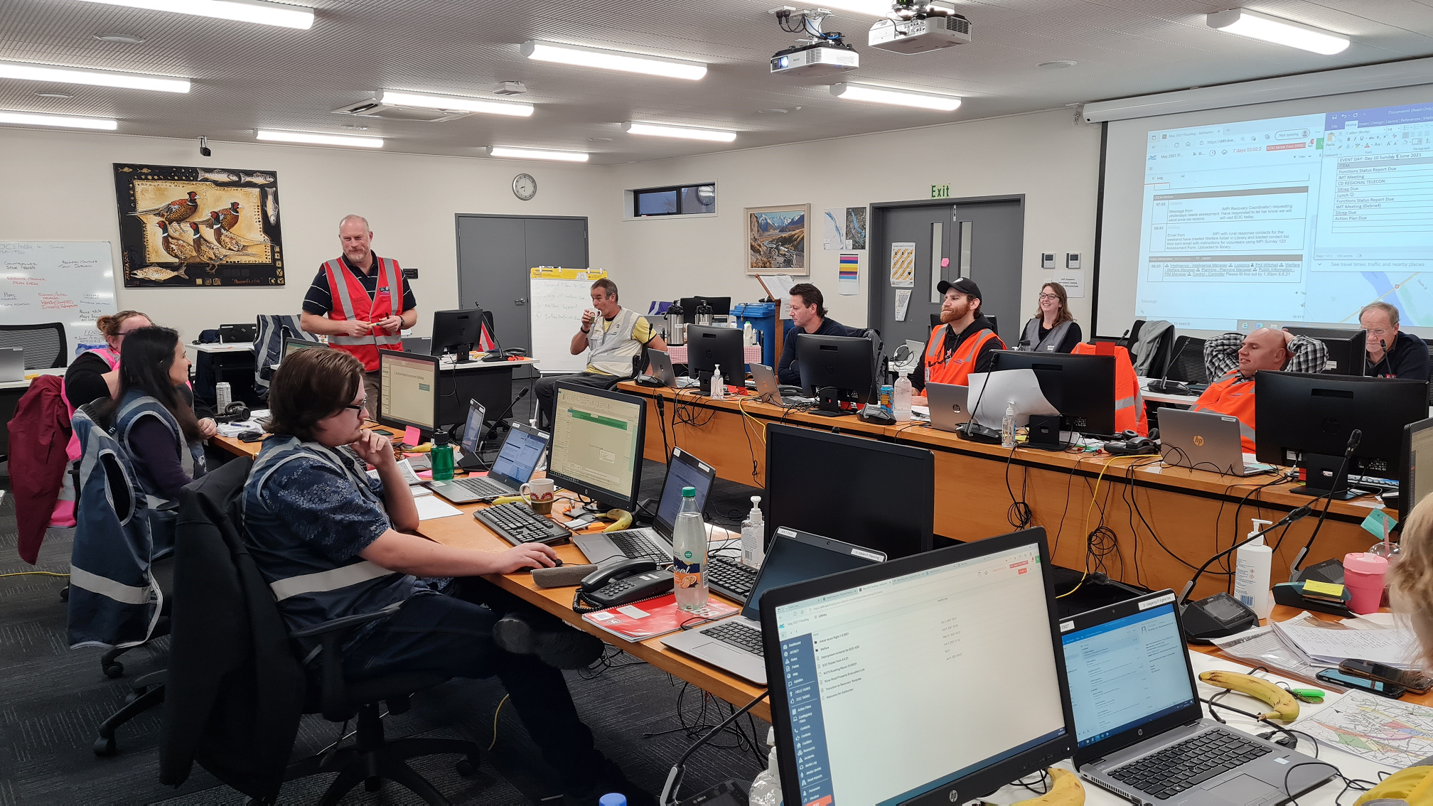 Civil Defence volunteers discussing today's main action points