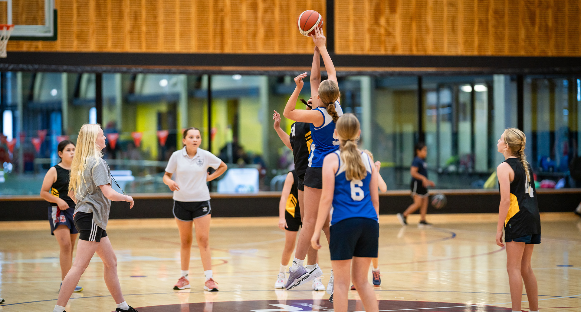 Junior basketballers in action