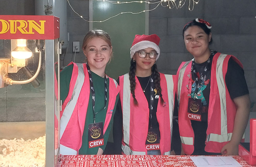 Youth Council prepare free popcorn at Family Movie Night