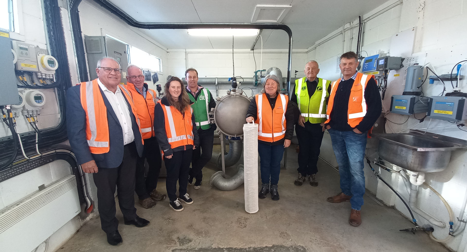 Group in small plant room