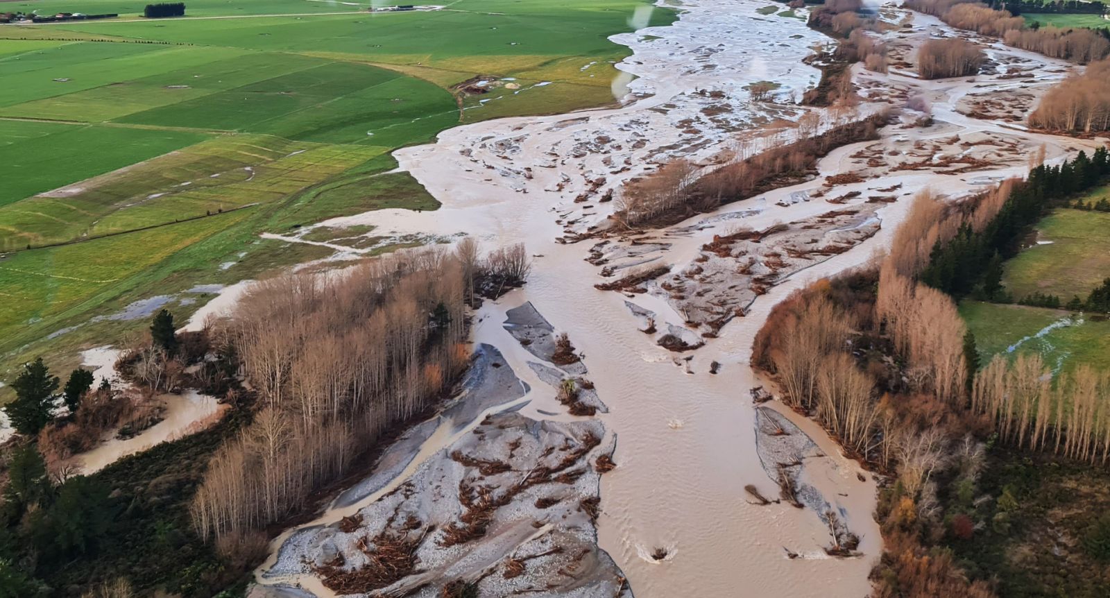 Flooded land with muddy water banner image