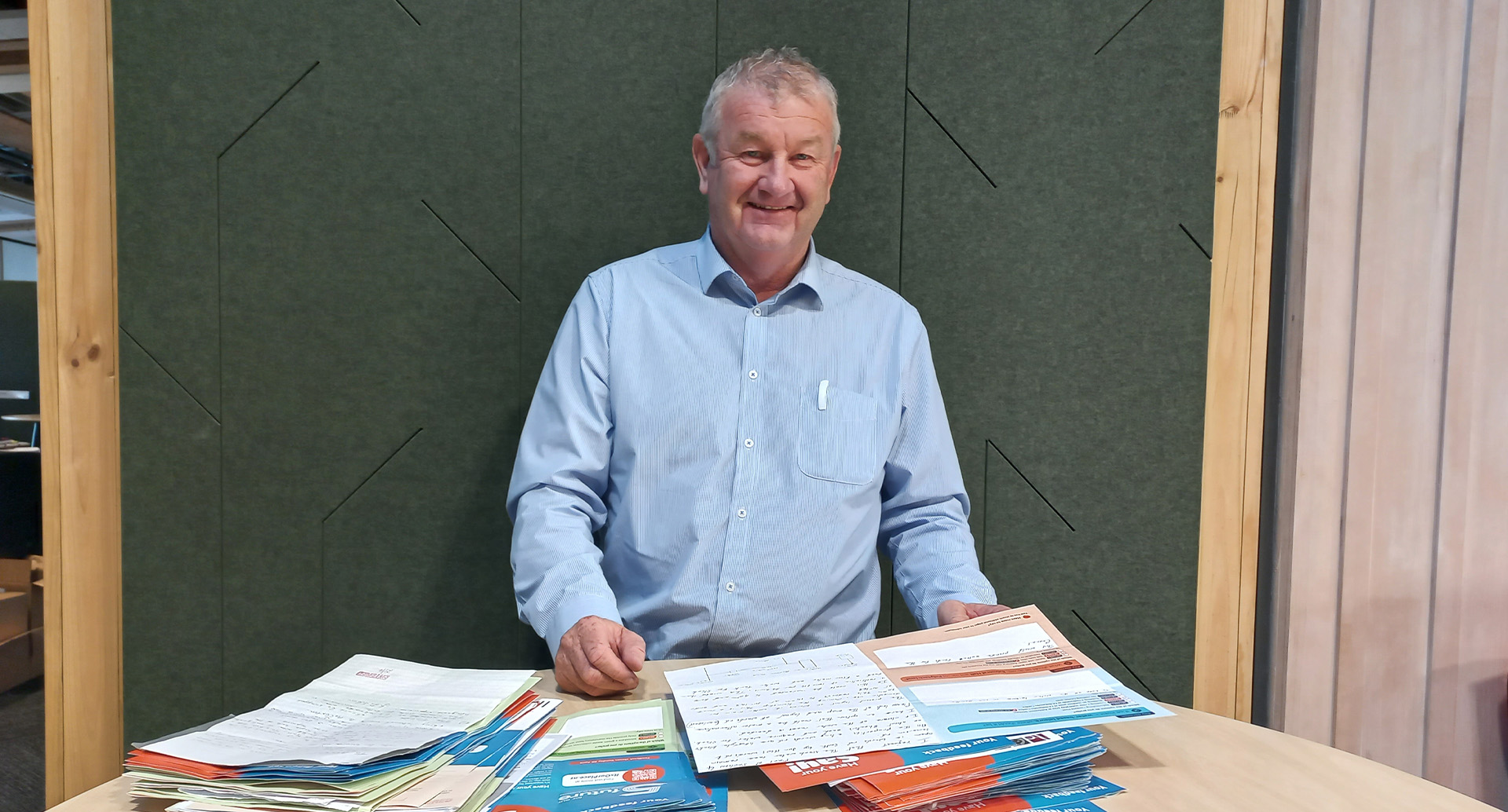 Man reading many documents